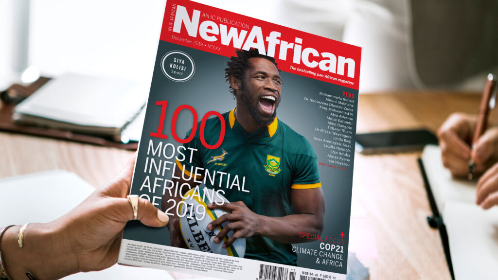cover of New Africa magazine design with red banner and Australian rugby player cheering